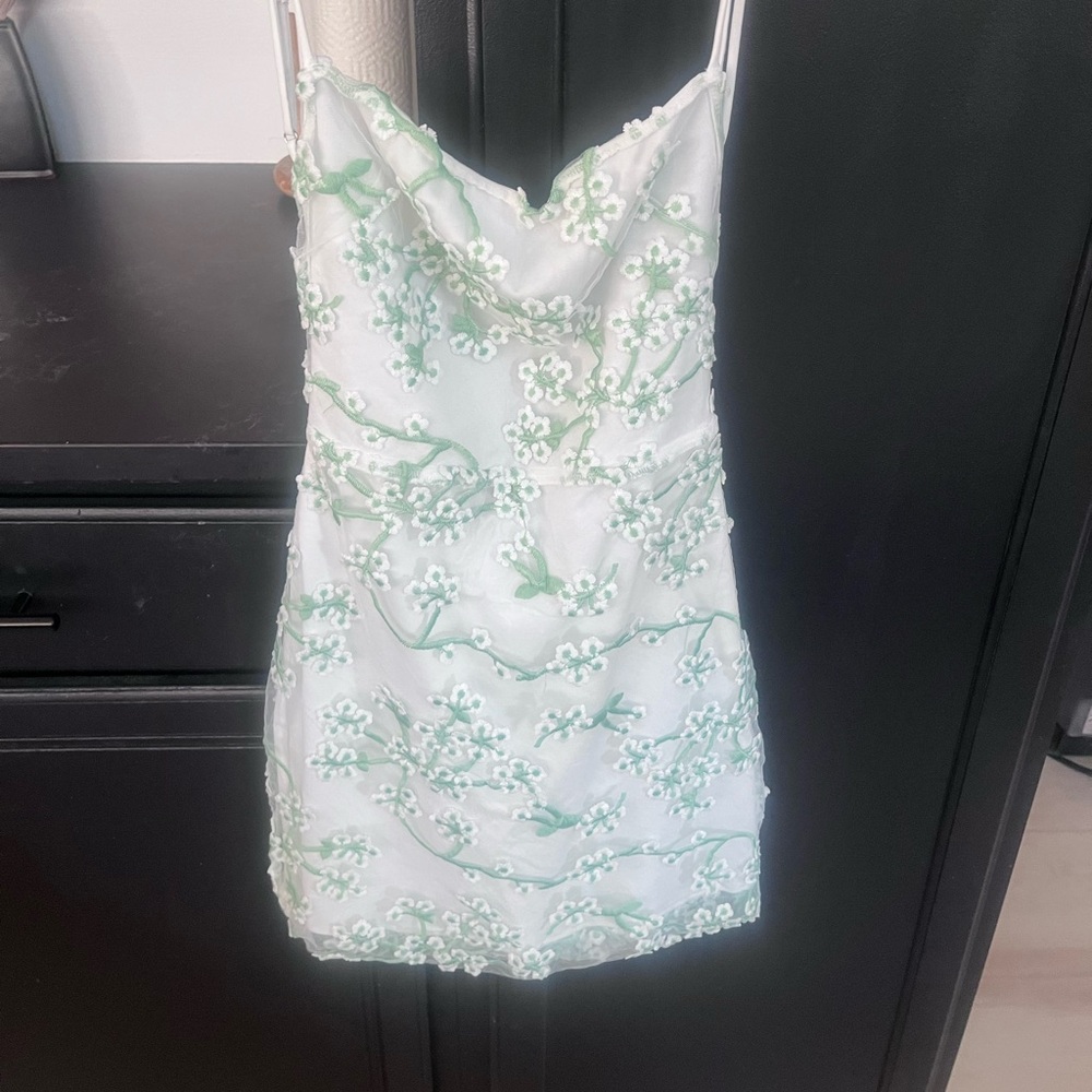 Bundle of women’s dresses and romper/jumpsuit